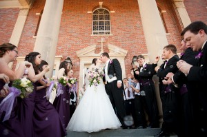 Jessica Hendrix Photography bride and groom exiting church with bubbles