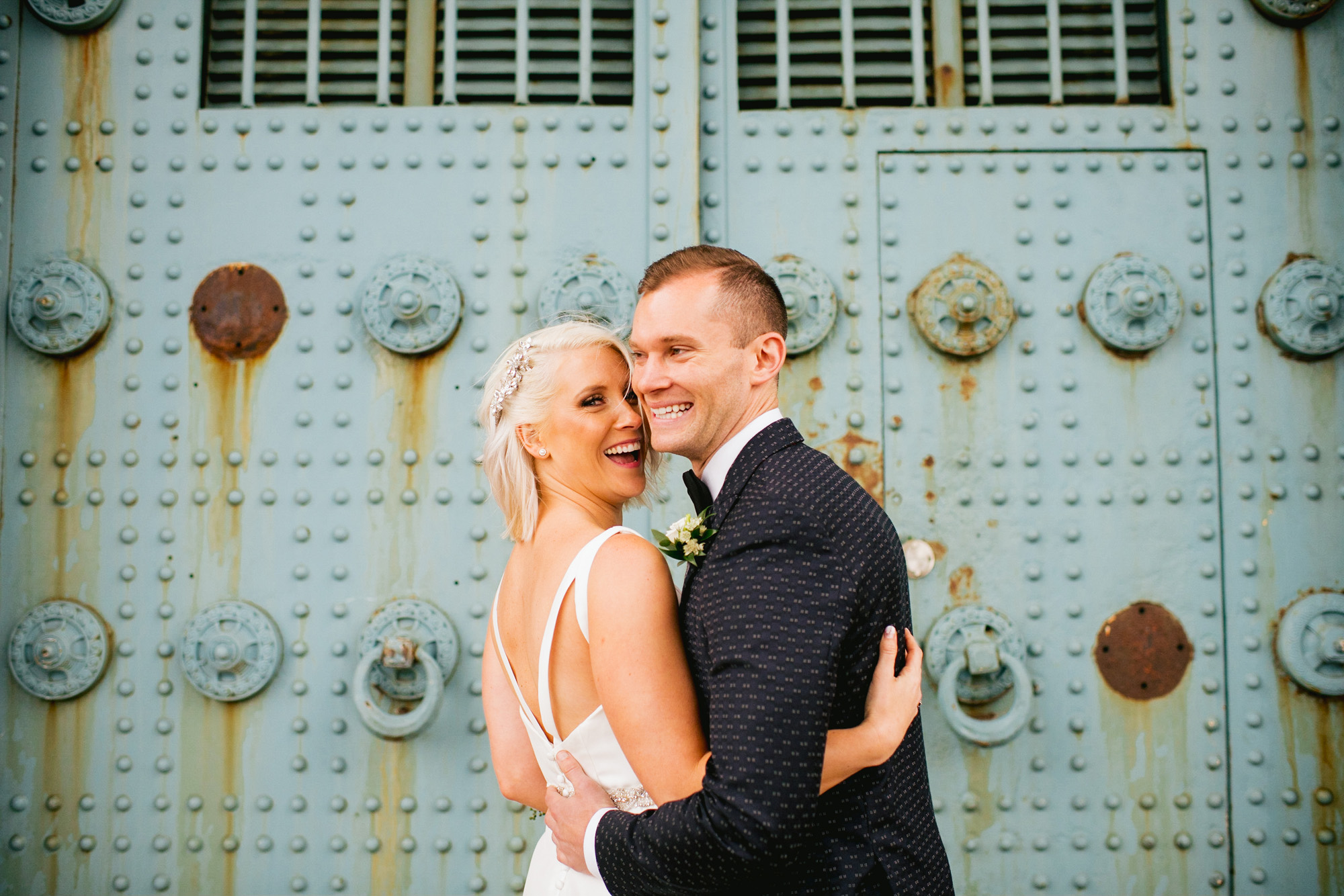 Industrial chic bride and groom blue wall philadelphia